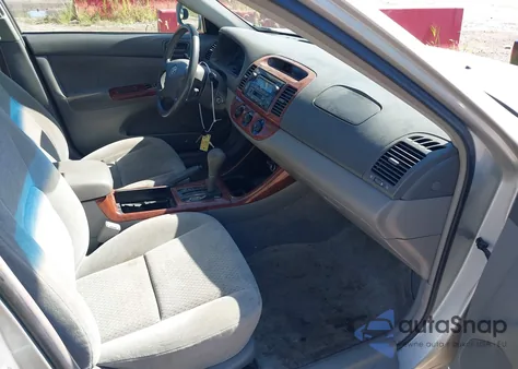 2002 Toyota Camry Le from USA, damaged, VIN 4T1BE32K12U056935